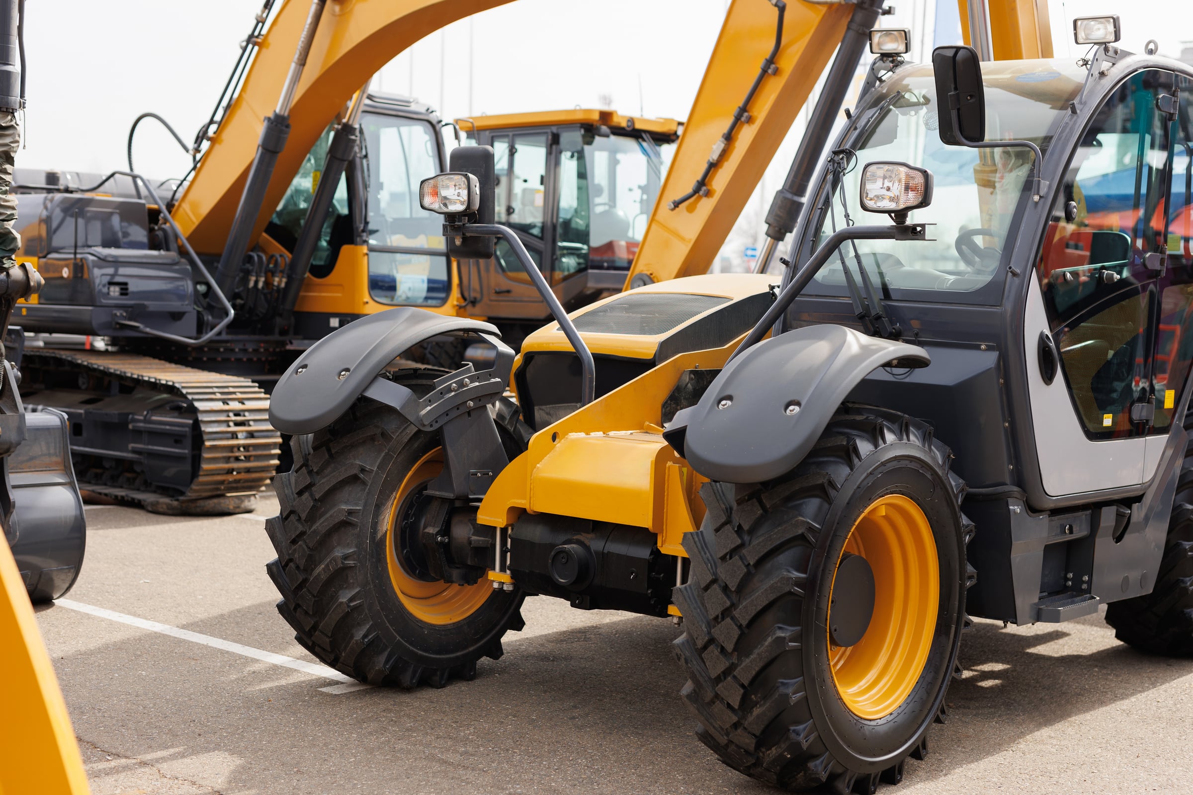 Mini excavators in a row