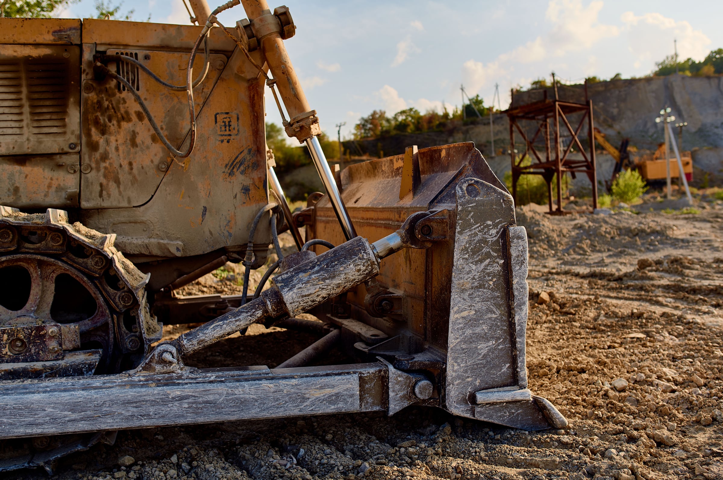 Yellow excavator digging